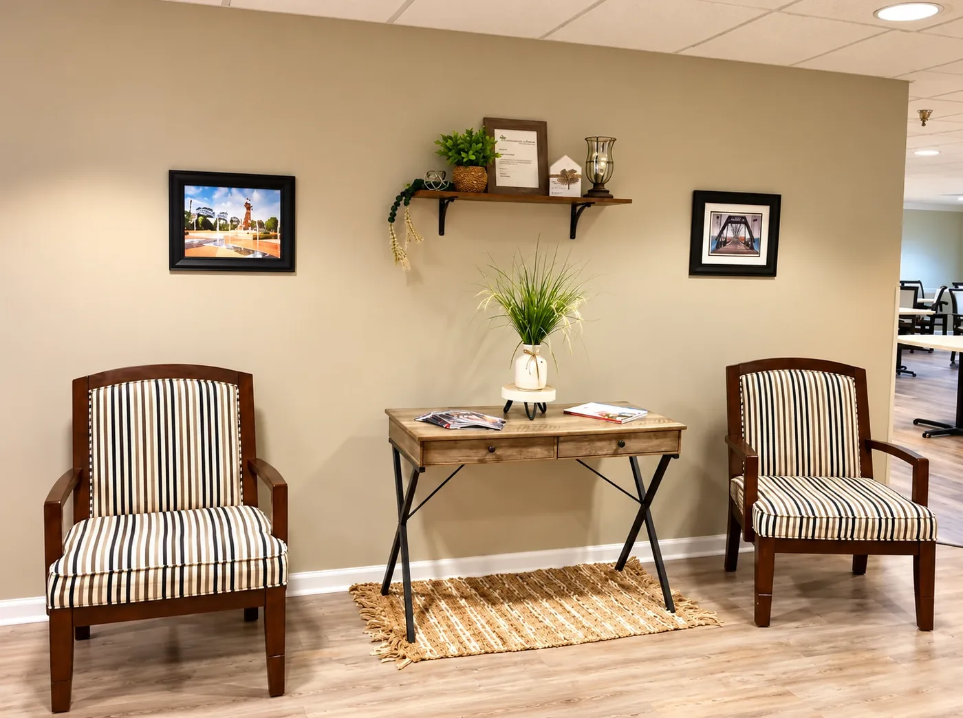 The Regency House sitting room, with upholstered armchairs and framed prints of Chattanooga